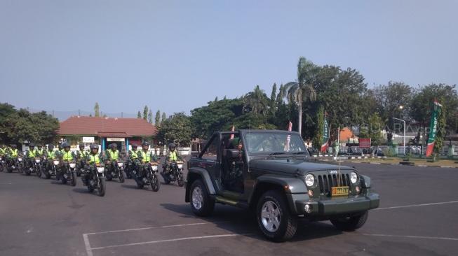 Iring-iringan penyambutan dari Kodam V / Brawijaya Surabaya [Suara.com/Achmad  Ali].