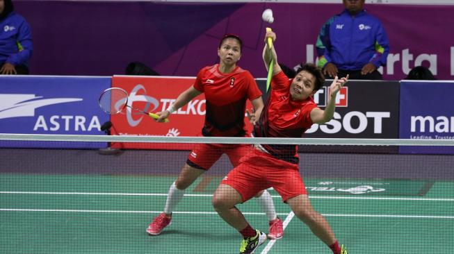 Pasangan ganda putri Indonesia, Greysia Polii/Apriyani Rahayu, saat tampil di Asian Games 2018. [Humas PBSI]