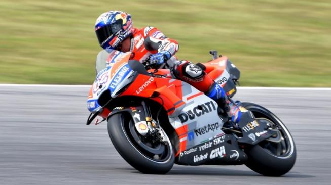 Pebalap Ducati, Andrea Dovizioso, menjalani sesi latihan bebas MotoGP San Marino di Sirkuit Misano, Jumat (7/9/2018). [AFP/Tiziana Fabi]