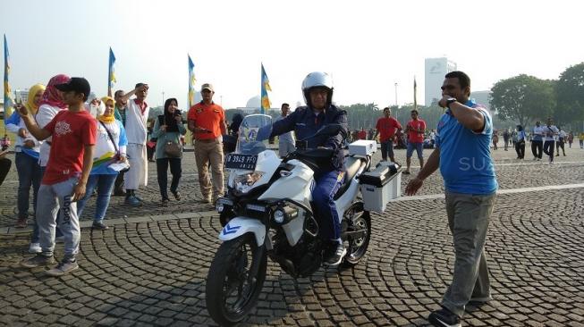 Naik Moge, Anies Baswedan Tiba di Festival Jakarta Sehat