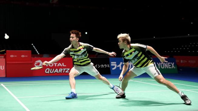 Pasangan ganda putra Indonesia, Kevin Sanjaya Sukamuljo/Marcus Fernaldi Gideon, melaju ke perempat final Jepang Open 2018. The Minions—julukan Kevin/Marcus—memenangi 'Perang Saudara' atas Ade Yusuf Santoso/Wahyu Nayaka Arya Pangkaryanira, Kamis (13/9). [Humas PBSI]