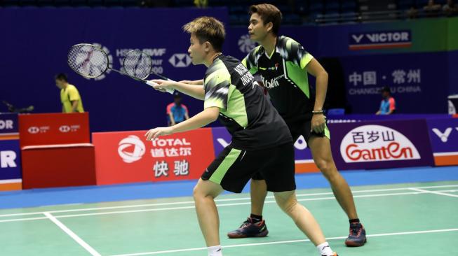 Pasangan ganda campuran Indonesia, Tontowi Ahmad/Liliyana Natsir, melaju ke babak kedua Cina Open 2018 usai mengalahkan pasangan baru Jepang, Yuki Kaneko/Misaki Matsutomo, Selasa (18/9/2018). [Humas PBSI]