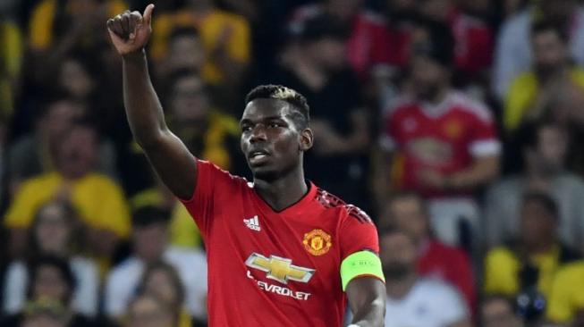 Selebrasi gelandang andalan Manchester United, Paul Pogba, usai menjebol gawang Young Boys. [Alain GROSCLAUDE / AFP]