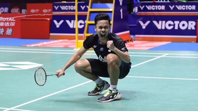 Pebulu tangkis tunggal putra Indonesia Anthony Sinisuka Ginting berekspresi ketika bertanding melawan pebulu tangkis Jepang Kento Momota pada laga final China Open 2018 di di Olympic Sports Center Xincheng Gymnasium, Changzhou, Cina, Minggu (23/9). ANTARA FOTO/HO/Humas PP PBSI