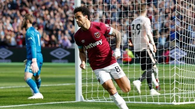 Gelandang West Ham United Felipe Anderson merayakan golnya ke gawang Manchester United di London Stadium. Ian KINGTON / AFP