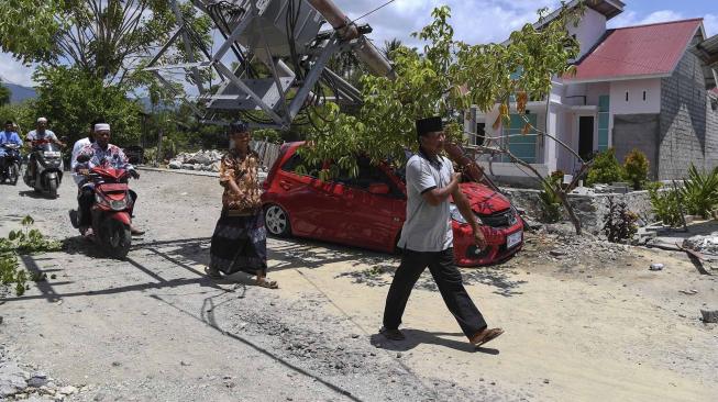 Mayat Korban Longsor Gempa Sulteng Ditemukan Masih Naik Motor