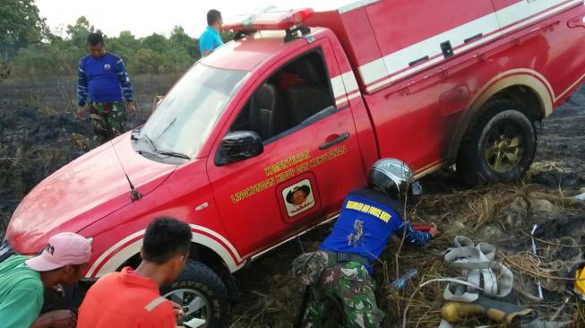 Kecelakaan terjadi pada mobil tangki slip on unit Manggala Agni Daops Tinanggea, yang digunakan untuk pemadaman. (Dok: KLHK)