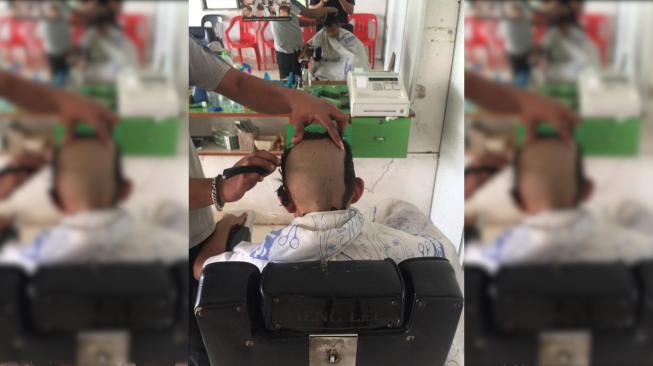 Gara-gara Warnai Rambut, Bocah Ini Digunduli Ayahnya