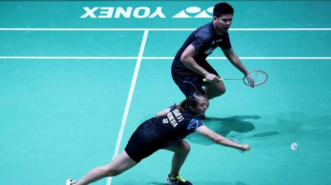 Pasangan ganda campuran Indonesia, Praveen Jordan/Melati Daeva Oktavianti, kalah dari pasangan Cina, Wang Yilyu/Huang Dongping, di babak kedua Prancis Open 2018, Kamis (25/10). [Humas PBSI]