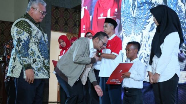 Menteri Ketenagakerjaan (Menaker), M. Hanif Dhakiri, saat memberikan arahan pada acara Sinergi Youth Career Fest, di BBPLK Semarang, Selasa (13/11/2018). (Dok: Kemnaker)