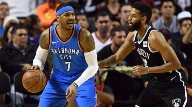 Pebasket NBA, Carmelo Anthony (kiri), saat masih bermain di Oklahoma City Thunder. [AFP/Pedro Pardo]