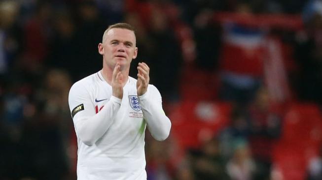 Wayne Rooney menjalani laga terakhirnya bersama Timnas Inggris melawan Timnas Amerika Serikat pada laga uji coba internasional di Wembley, Jumat (16/11/2018) dini hari WIB. [Ian KINGTON / AFP]