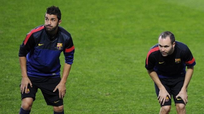 David Villa (kiri) bersama Andres Iniesta mengikuti sesi latihan di Barcelona [AFP]