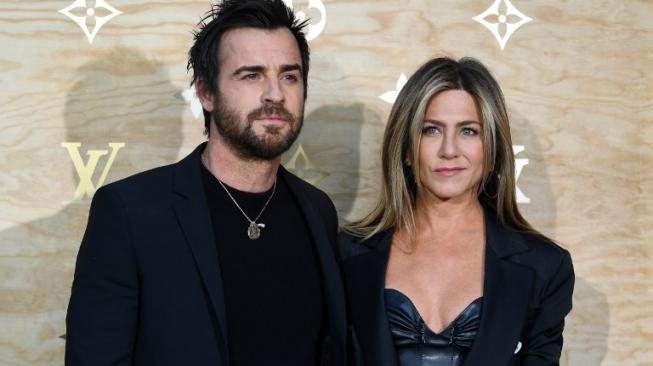 Jennifer Aniston dan Justin Theroux. (Gabriel Bouys / AFP)