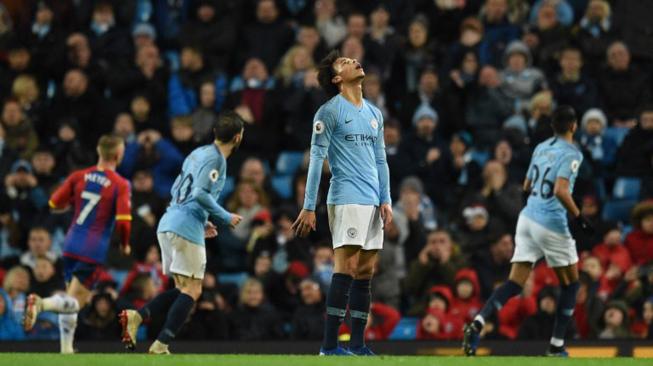 Ekspresi Gelandang Manchester City Leroy Sane usai timnya Manchester City dikalahkan Crystal Palace di Stadion Etihad, Manchester, Inggris, Sabtu (22/12).
[Oli SCARFF / AFP]