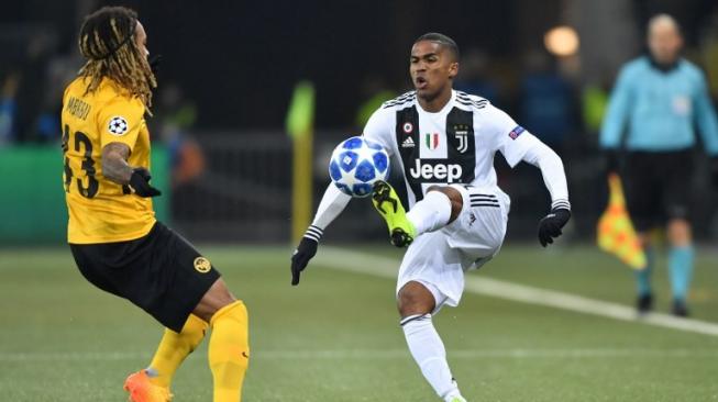 Winger Juventus, Douglas Costa. [Fabrice COFFRINI / AFP]