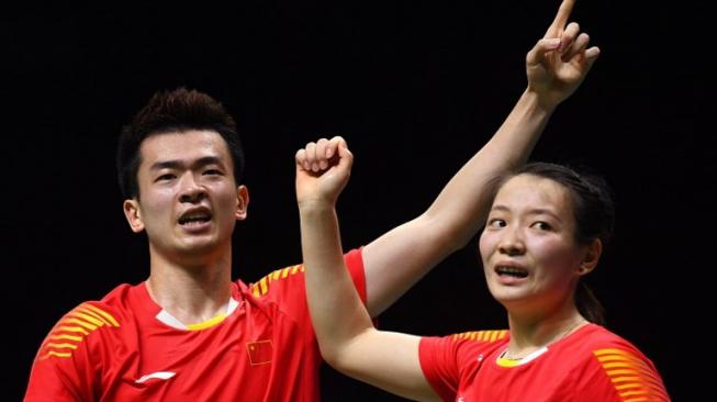 Pasangan ganda campuran Cina, Zheng Siwei/Huang Yaqiong. [AFP/Johannes Eisele]