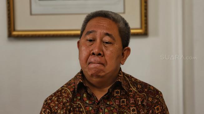 Anggota Dewan Pengawas BPJS Ketenagakerjaan Syafri Adnan Baharuddin memberi keterang pers terkait tudingan pelecehan dan pemerkosaan yang dilakukannya kepada asisten ahli berinisial A di Hotel Hermitage, Jakarta, Minggu (30/12). [Suara.com/Muhaimin A Untung]