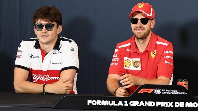 Duet baru Ferrari di F1 2019, Charles Leclerc dan Sebastian Vettel. [AFP/Boris Horvat]