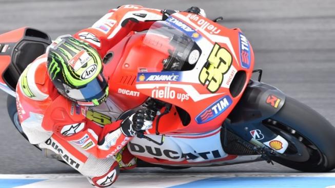 Pebalap MotoGP, Cal Crutchlow saat memperkuat tim Ducati di musim 2014. [AFP/Peter Parks]