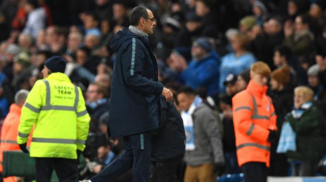 Ekspresi Pelatih Chelsea Maurizio Sarri usai timnya Chelsea dikalahkan oleh Manchester City di Stadion Etihad, Manchester, Inggris, Minggu (10/2). [Oli SCARFF / AFP]