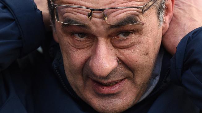 Ekspresi Pelatih Chelsea Maurizio Sarri usai timnya Chelsea dikalahkan oleh Manchester City di Stadion Etihad, Manchester, Inggris, Minggu (10/2). [Oli SCARFF / AFP]