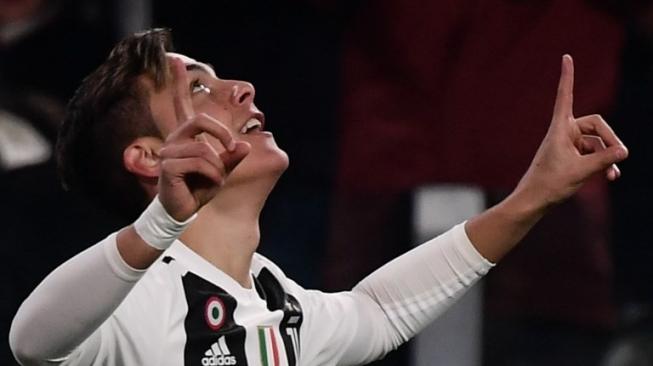 Striker Juventus Paulo Dybala melakukan selebrasi setelah mencetak gol ke gawang Frosinone di Juventus stadium Turin. Marco BERTORELLO / AFP