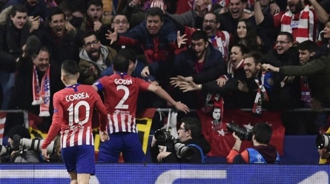 Bek Atletico Madrid Diego Godin merayakan golnya ke gawang Juventus pada laga Liga Champions di Wanda Metropolitan stadium. JAVIER SORIANO / AFP