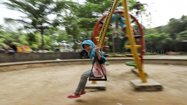 Suasana di Taman Mahoni, Jakarta, Jumat (22/2). [Suara.com/Muhaimin A Untung]