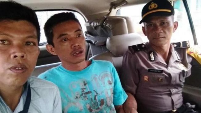 Romi Sepriawan saat dibekuk polisi terkait kasus pembunuhan terhadap istrinya, (istimewa/Batamnews)