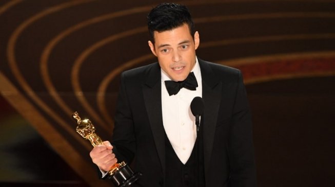 Rami Malek meraih Best Actor Piala Oscar 2019. [VALERIE MACON / AFP]