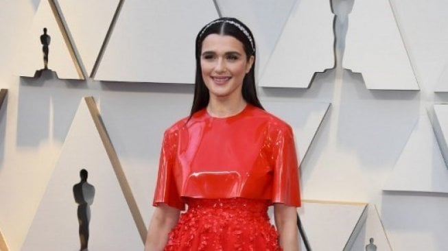 Selebriti dengan Penampilan Tak Biasa di Oscar 2019. (Mark Ralston/AFP)