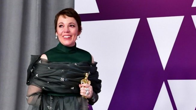 Selebriti dengan Penampilan Tak Biasa di Oscar 2019. (Mark Ralston/AFP)