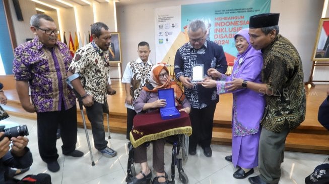 Sejumlah penyandang disabilitas menghadiri debat publik tim Sukses Pasangan Calon Presiden dan Wakil Presiden Pemilu 2019 di Kantor KPU, Jakarta, Kamis, (28/2).[Suara.com/Muhaimin A Untung]