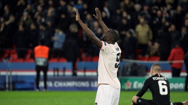 Pemain depan Manchester United Romelu Lukaku bergembira setelah mencetak gol pada laga leg kedua 16 besar Liga Champions di Stadion Parc des Princes, Paris, Perancis, Kamis (7/3) dini hari WIB.[FRANCK FIFE / AFP]