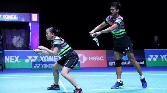 Pasangan ganda campuran Indonesia, Tontowi Ahmad/Winny Oktavina Kandow, melaju ke babak kedua All England 2019 usai mengalahkan rekan senegaranya, Alfian Eko Prasetya/Marsheilla Gischa Islami, Rabu (6/3/2019). [Humas PBSI]