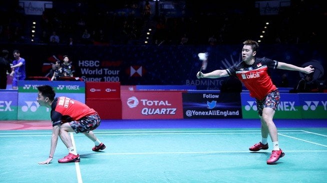 Pasangan ganda putra Indonesia, Kevin Sanjaya Sukamuljo/Marcus Fernaldi Gideon, tersingkir dari ajang All England 2019 usai takluk dari Liu Cheng/Zhang Nan (China) di Arena Birmingham, Inggris, Rabu (6/3/2019). [Humas PBSI]