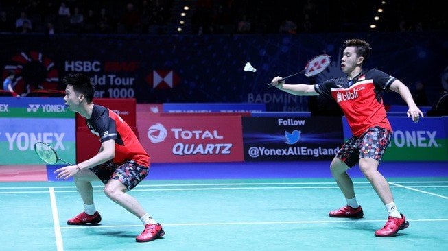 Pasangan ganda putra Indonesia, Kevin Sanjaya Sukamuljo/Marcus Fernaldi Gideon, tersingkir dari ajang All England 2019 usai takluk dari Liu Cheng/Zhang Nan (China) di Arena Birmingham, Inggris, Rabu (6/3/2019). [Humas PBSI]