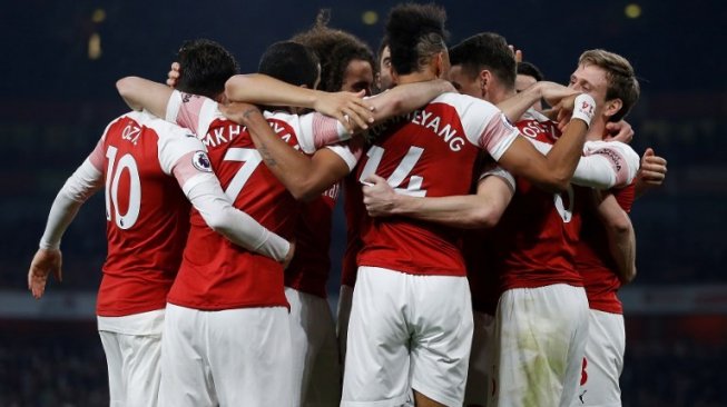 Para pemain Arsenal merayakan gol, [Ian KINGTON / AFP]