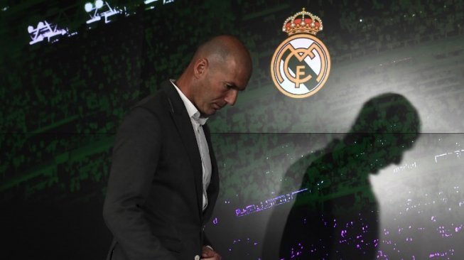 Zinedine Zidane saat jumpa pers setelah resmi ditunjuk kembali melatih Real Madrid menggantikan Santiago Solari yang baru saja dipecat. PIERRE-PHILIPPE MARCOU / AFP  