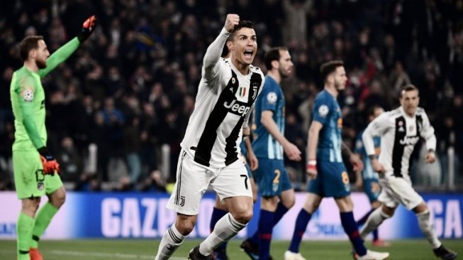 Bintang Juventus Cristiano Ronaldo merayakan golnya ke gawang Atletico Madrid di Juventus Stadium di laga Liga Champions. Marco BERTORELLO / AFP