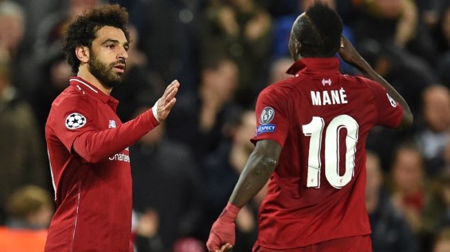 Duo winger andalan Liverpool, Mohamed Salah (kiri) dan Sadio Mane. [Oli SCARFF / AFP]