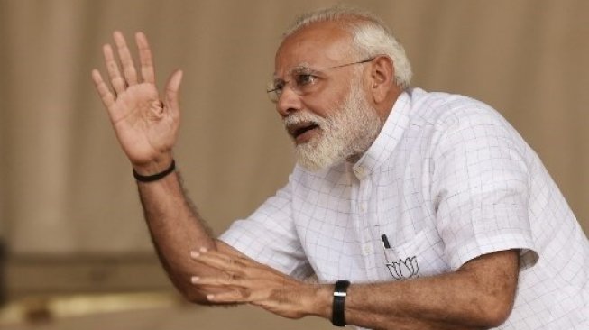 Perdana menteri India Narendra Modi. [AFP/Dibyangshu Sarkar]
