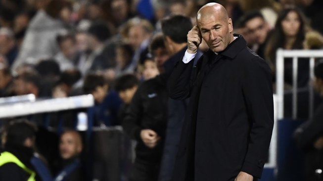Pelatih Real Madrid, Zinedine Zidane. [PIERRE-PHILIPPE MARCOU / AFP]