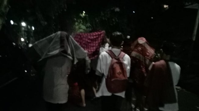 Hujan Deras, Massa Tinggalkan Lokasi Pesta Kemenangan Prabowo