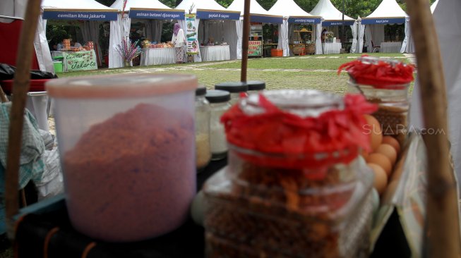 Suasana Festival Warisan Budaya Tak Benda di Kawasan Setu Babakan, Jakarta, Jumat (26/4). [Suara.com/Arief Hermawan P]