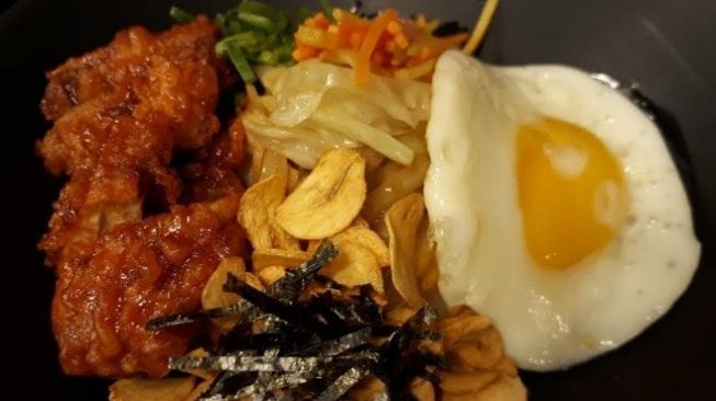 Kimchi fried rice. (Suara.com/Risna Halidi)