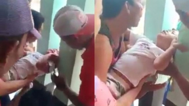 Tak Diawasi Orang Tua, Kepala Bocah Ini Tersangkut Pagar