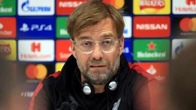 Manajer Liverpool Jurgen Klopp memberikan keterangan dalam jumpa pers jelang leg kedua semifinal Liga Champions di Anfield, Senin (6/5/2019) [AFP]