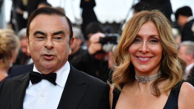 Dalam perhelatan Festival Film Cannes 2018, orang nomor satu Renault saat itu, Carlos Ghosn hadir, didampingi istrinya Carole Ghosn, menyaksikan pemutaran film "Ash is Purest White" [AFP/Alberto Pizzoli]. 